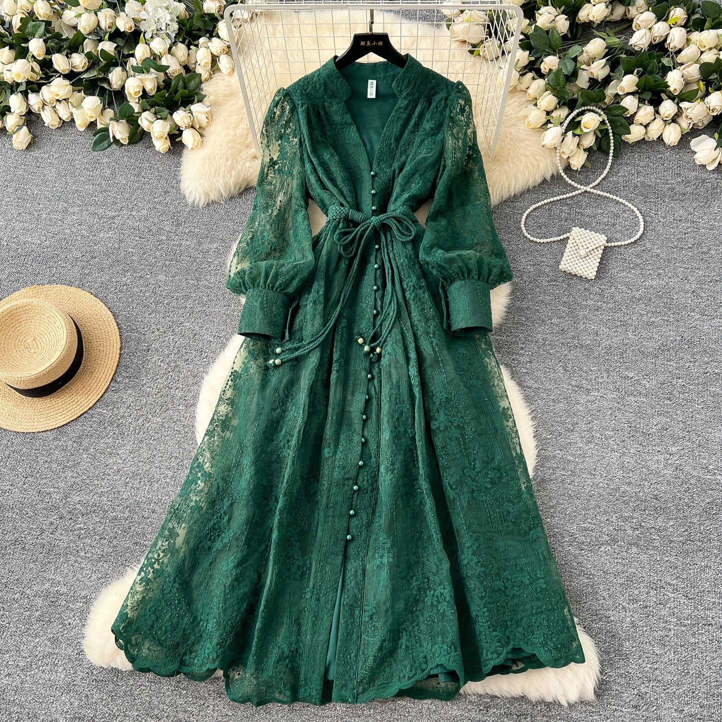 French high-end women's dress for spring 2025 with waist cinching, heavy embroidery, V-neck lantern sleeves, single breasted long skirt