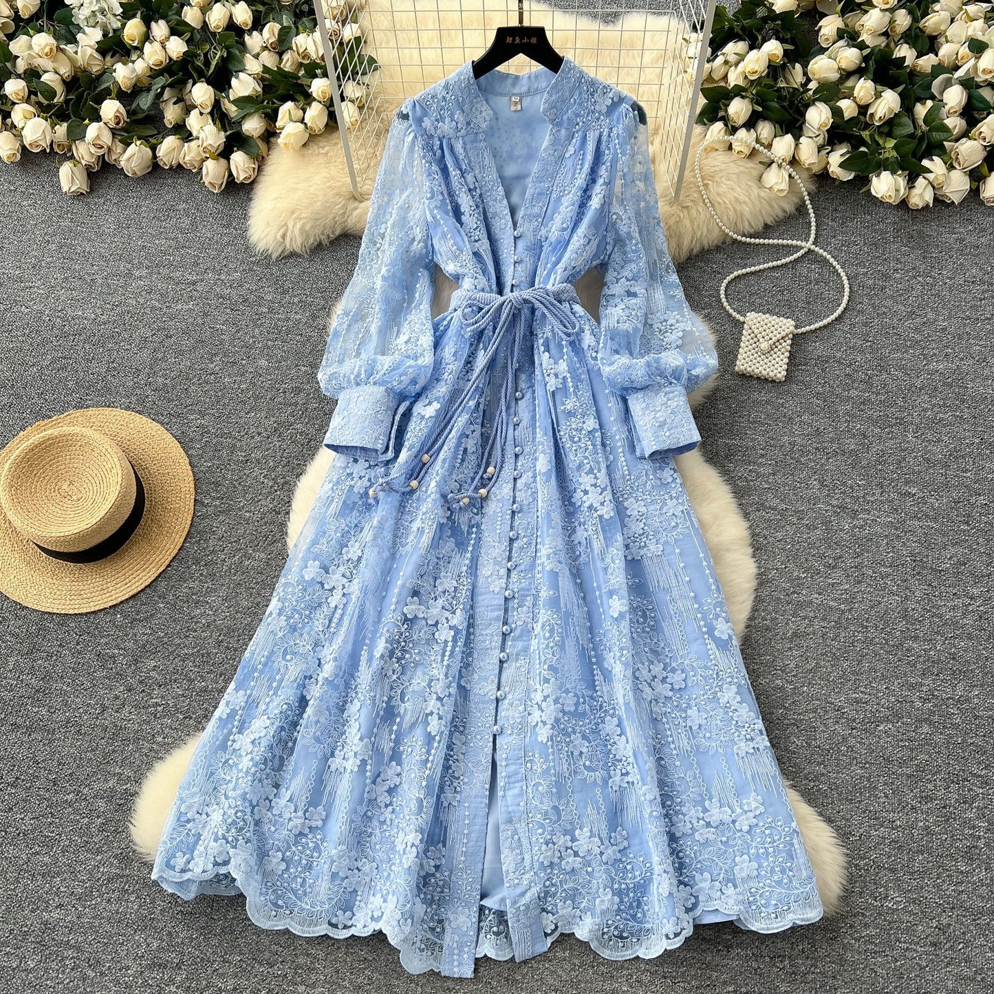 French high-end women's dress for spring 2025 with waist cinching, heavy embroidery, V-neck lantern sleeves, single breasted long skirt