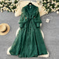 French high-end women's dress for spring 2025 with waist cinching, heavy embroidery, V-neck lantern sleeves, single breasted long skirt