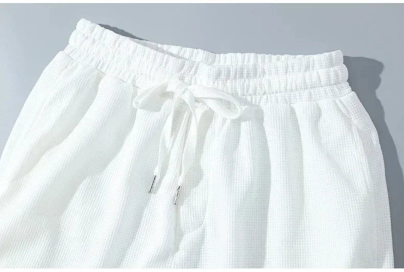 Men's casual sports suit, Korean style short-sleeved shirt + quarter pants, fashion high-end two-piece set, new summer 2025