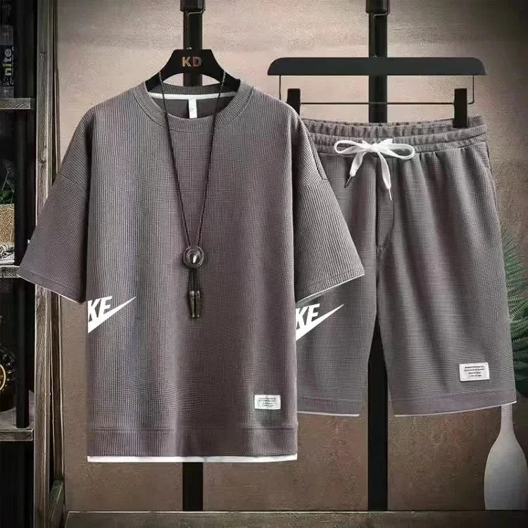 Men's casual sports suit, Korean style short-sleeved shirt + quarter pants, fashion high-end two-piece set, new summer 2025